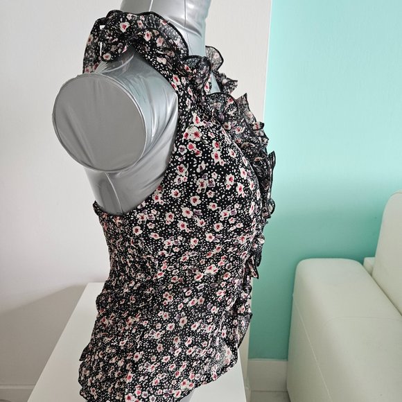 This effortlessly cheerful ruffled halter top makes every day feel like Spring L - Picture 2 of 3